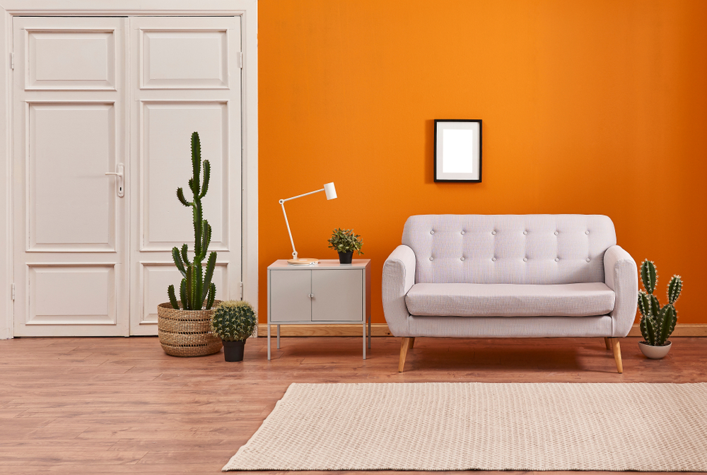 Grey Sofa With Orange Background