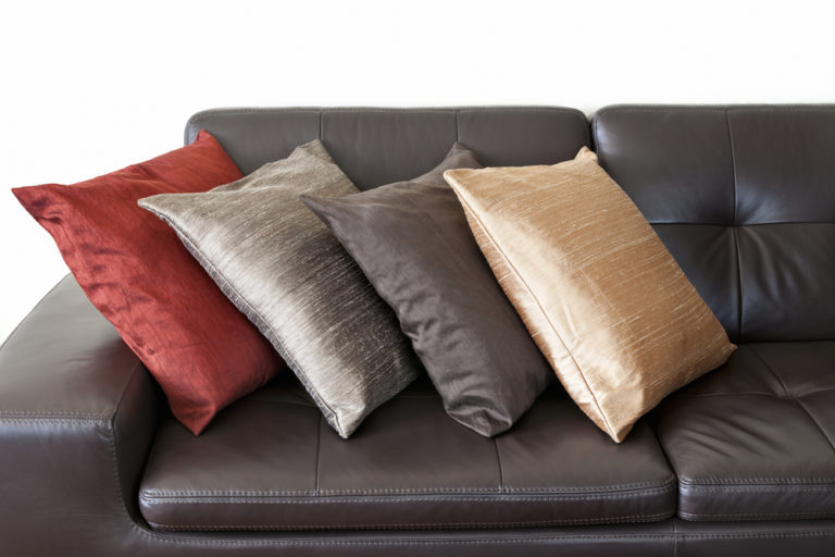 How Do You Decorate A Sofa With Throws? Four Centuries